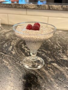 Chia seed pudding topped with raspberries